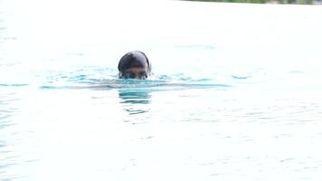 Asian men practicing swimming and preparing to play water polo and stretching and resting for water sports. video