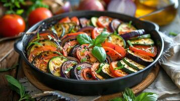 A Cast Iron Skillet Filled With Freshly Baked Ratatouille photo