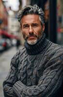 Portrait of a Middle-Aged Man With Gray Hair and Beard in a City Setting photo