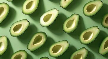 Green Ripe Avocados Arranged on Green Background photo