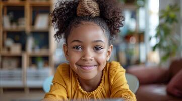 Young Girl With Curly Hair Smiles at the Camera in Her Home photo