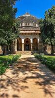 Sikandar Lodi Tomb, Delhi. Medieval monument, mosque. Historic mausoleum, ruler of Delhi Sultanate. Reign of Lodhi dynasty, Indo-Islamic architecture. Dome, arched entrances, fluted columns. photo