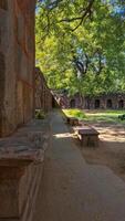 Sikandar Lodi Tomb, Delhi, arched corridors, domed chambers, carved sandstone walls, testament to ancient craftsmanship, Indo-Islamic architecture, preserved historical monument, heritage value photo