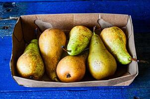 Original natural pears packed in a cardboard box.Original natural pears packed in a cardboard box. photo