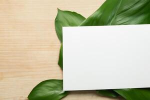 Beautiful Mockup Paper on Wooden Background Combined with Leaves A Charming Fusion of Nature and Elegance, Perfect for Showcasing Your Creative Designs with a Touch of Rustic Sophistication photo