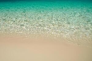 Beautiful Waves and Sands A Mesmerizing Display of Nature's Harmony, Where Crystal Clear Waters Meet Soft Golden Sands, Creating a Serene and Captivating Seascape That Enchants the Soul photo