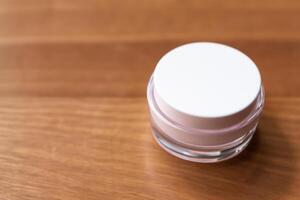 The beautiful photo captures the elegance of good cosmetic packaging for cream containers, highlighting future cosmetic innovations with sleek, modern designs