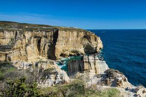 Exploring the Beauty of Majestic Cliffs, Nature's Impressive Coastal Formations photo