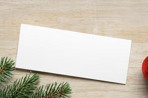 Beautiful Mockup White Card with Christmas Ornaments, A Festive Touch for Your Holiday Greetings photo