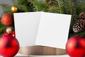 Beautiful Mockup White Card with Christmas Ornaments, A Festive Touch for Your Holiday Greetings photo