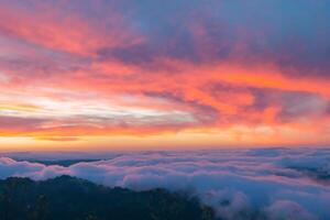 Beautiful Clouds Over the Mountains Create a Harmonious Atmosphere, Painting a Serene and Majestic Scene of Natural Beauty photo