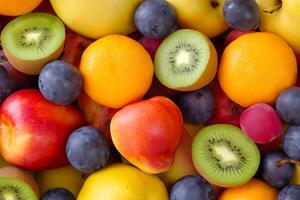 Beautiful Tropical Fruits Background A Luscious Display of Nature's Bounty, Featuring an Abundance of Colorful and Exotic Fruits Against a Vibrant and Refreshing Backdrop photo