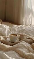 Cup of Coffee on White Blanket photo