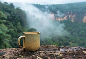 Cup of Coffee on Cliff photo