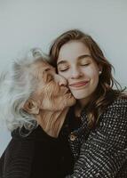 Older Woman Hugging Younger Woman photo