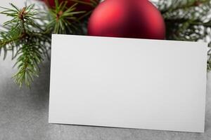 Beautiful Mockup White Card with Christmas Ornaments, A Festive Touch for Your Holiday Greetings photo