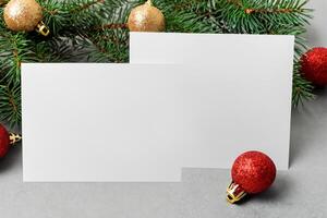 Beautiful Mockup White Card with Christmas Ornaments, A Festive Touch for Your Holiday Greetings photo