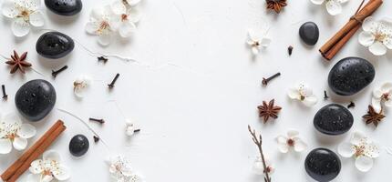 White Table With Black Rocks and Spices photo