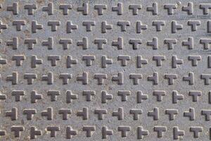 Metal texture background, metal plate with squares. Picture of metal background. photo