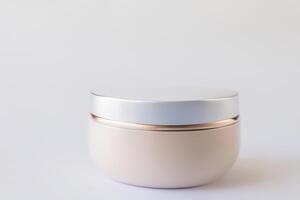 The beautiful mockup showcases good cosmetic packaging for cream containers, emphasizing future cosmetic innovations. photo