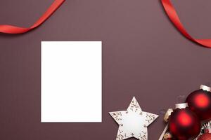 Beautiful Mockup White Card with Christmas Ornaments, A Festive Touch for Your Holiday Greetings photo