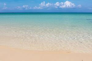 Beautiful Waves and Sands A Mesmerizing Display of Nature's Harmony, Where Crystal Clear Waters Meet Soft Golden Sands, Creating a Serene and Captivating Seascape That Enchants the Soul photo