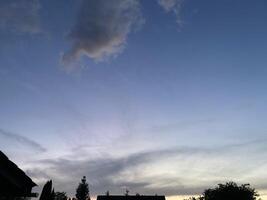 Clouds over countryside as weather changes photo