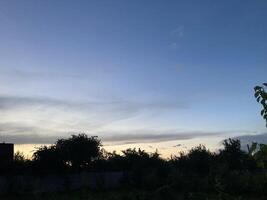 Clouds over countryside as weather changes photo