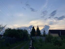 Clouds over countryside as weather changes photo