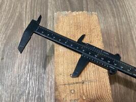 Caliper for measuring the dimensions of parts photo