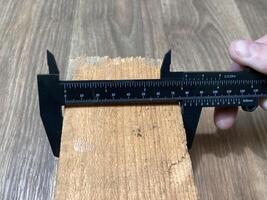 Caliper for measuring the dimensions of parts photo