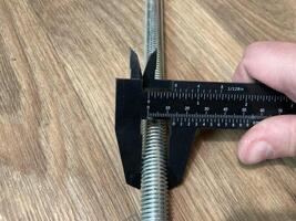 Caliper for measuring the dimensions of parts photo