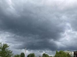 Clouds over countryside as weather changes photo