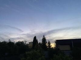 Clouds over countryside as weather changes photo