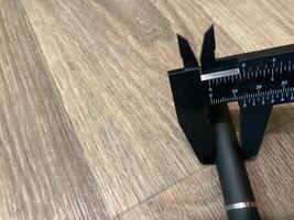 Caliper for measuring the dimensions of parts photo