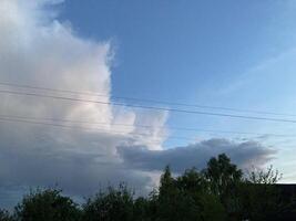 Clouds over countryside as weather changes photo