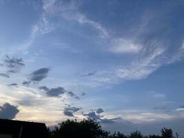 Clouds over countryside as weather changes photo