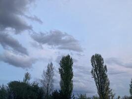 Thunderclouds before rain in the village photo