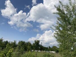 Clouds over countryside as weather changes photo