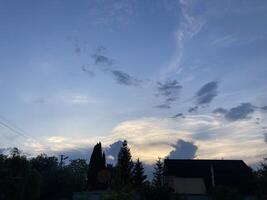 Clouds over countryside as weather changes photo