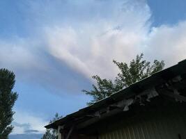 Clouds over countryside as weather changes photo