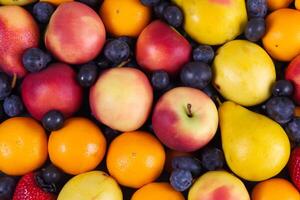 hermosa tropical frutas antecedentes un delicioso monitor de de la naturaleza generosidad, presentando un abundancia de vistoso y exótico frutas en contra un vibrante y refrescante fondo foto