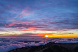 Beautiful Clouds Over the Mountains Create a Harmonious Atmosphere, Painting a Serene and Majestic Scene of Natural Beauty photo