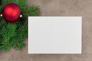 Beautiful Mockup White Card with Christmas Ornaments, A Festive Touch for Your Holiday Greetings photo