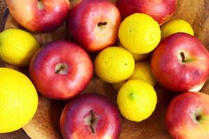 Beautiful Tropical Fruits Background A Luscious Display of Nature's Bounty, Featuring an Abundance of Colorful and Exotic Fruits Against a Vibrant and Refreshing Backdrop photo