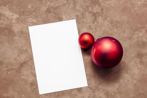 Beautiful Mockup White Card with Christmas Ornaments, A Festive Touch for Your Holiday Greetings photo