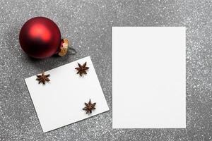 Beautiful Mockup White Card with Christmas Ornaments, A Festive Touch for Your Holiday Greetings photo