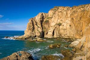 Exploring the Beauty of Majestic Cliffs, Nature's Impressive Coastal Formations photo