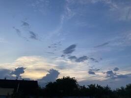 Clouds over countryside as weather changes photo