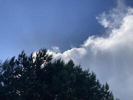 Clouds over countryside as weather changes photo